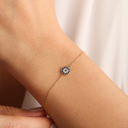 Evil eye bracelet worn on wrist