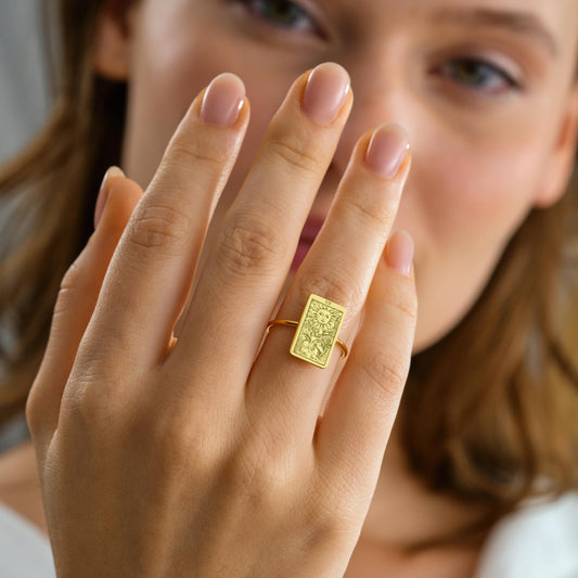 Engraved tarot signet ring detail