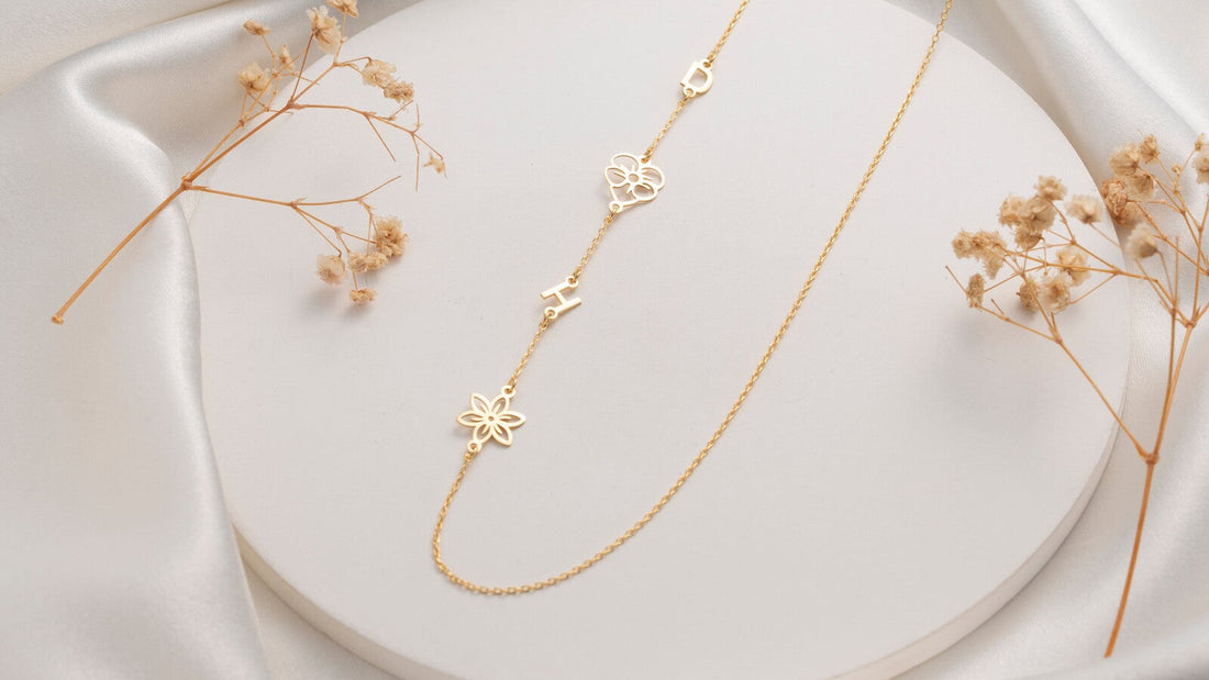 Personalized gold birth flower and initial necklace
