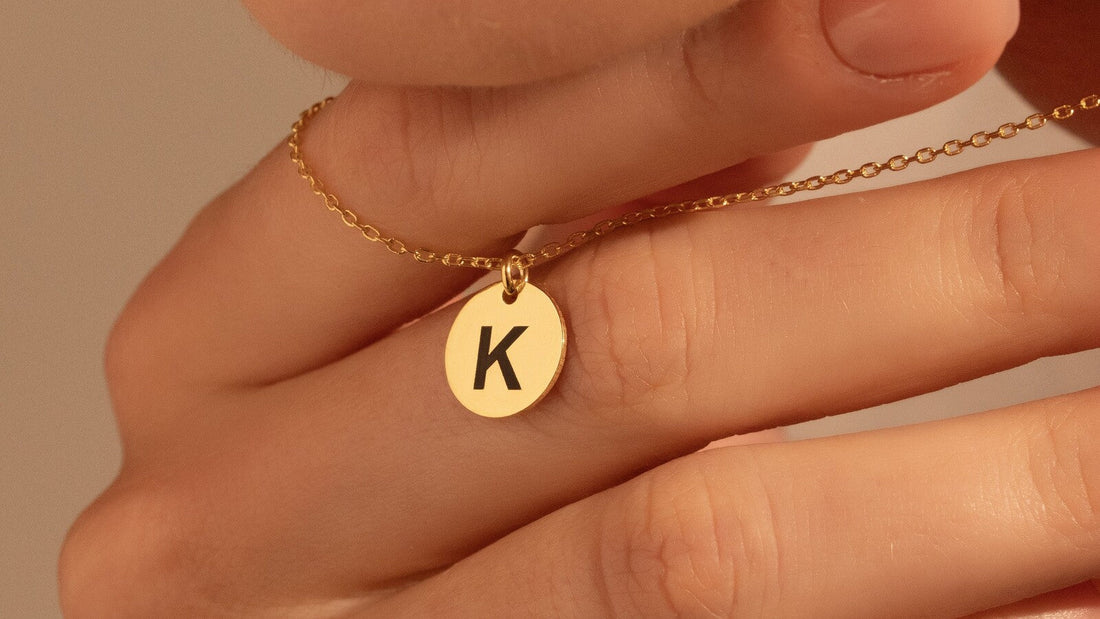 Personalized gold round initial necklace with letter K