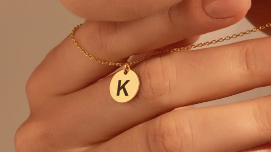Personalized gold round initial necklace with letter K