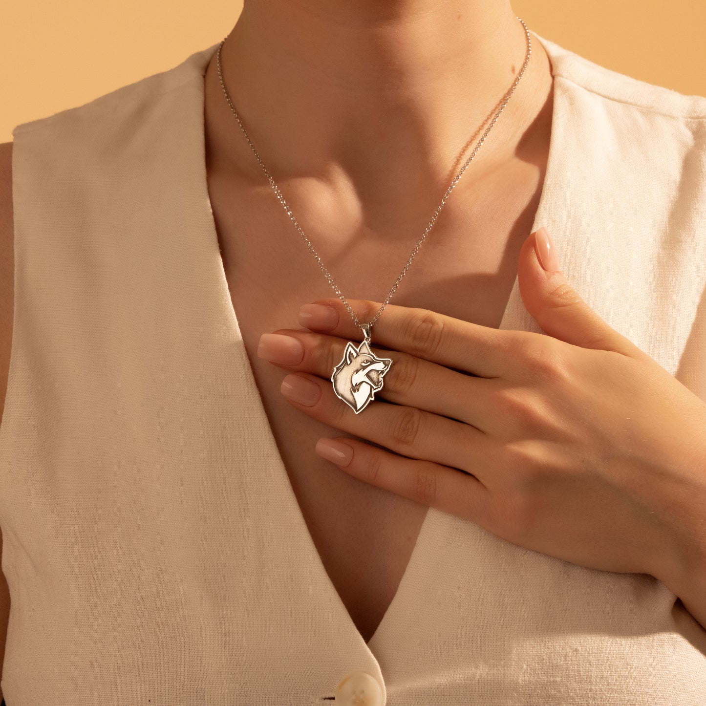 Unisex wildlife-inspired wolf necklace styled for everyday wear