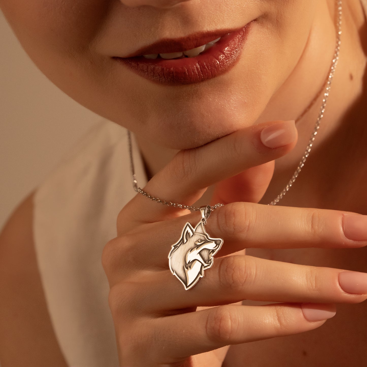 Modern wolf head necklace close-up