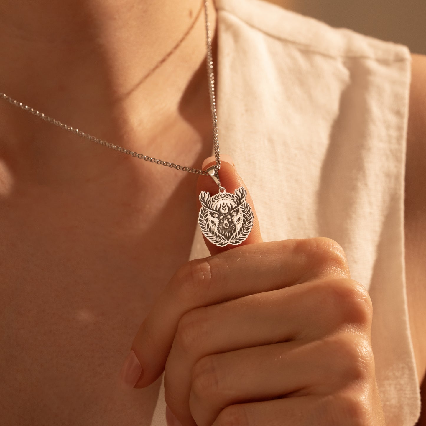 Nature-inspired deer pendant styled for everyday wear