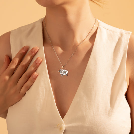 Nature-inspired sheep pendant necklace styled for everyday wear