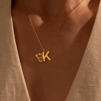 Detailed butterfly and initial necklace