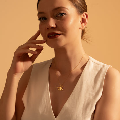 Detailed butterfly and initial necklace