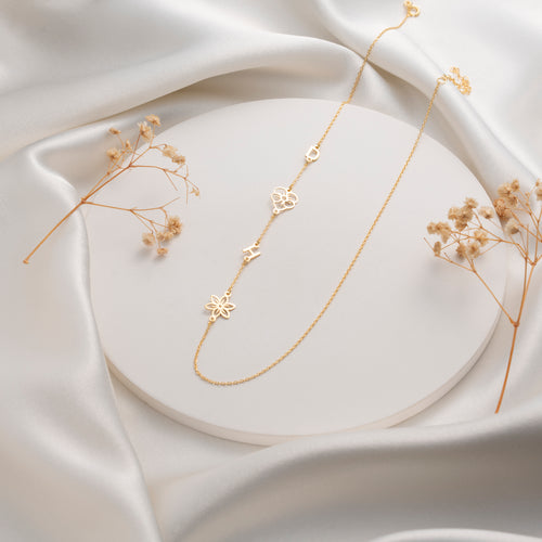 Personalized birth flower initial necklace in silver, gold and rose gold