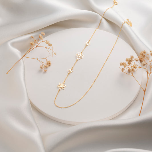 Personalized birth flower initial necklace in silver, gold and rose gold