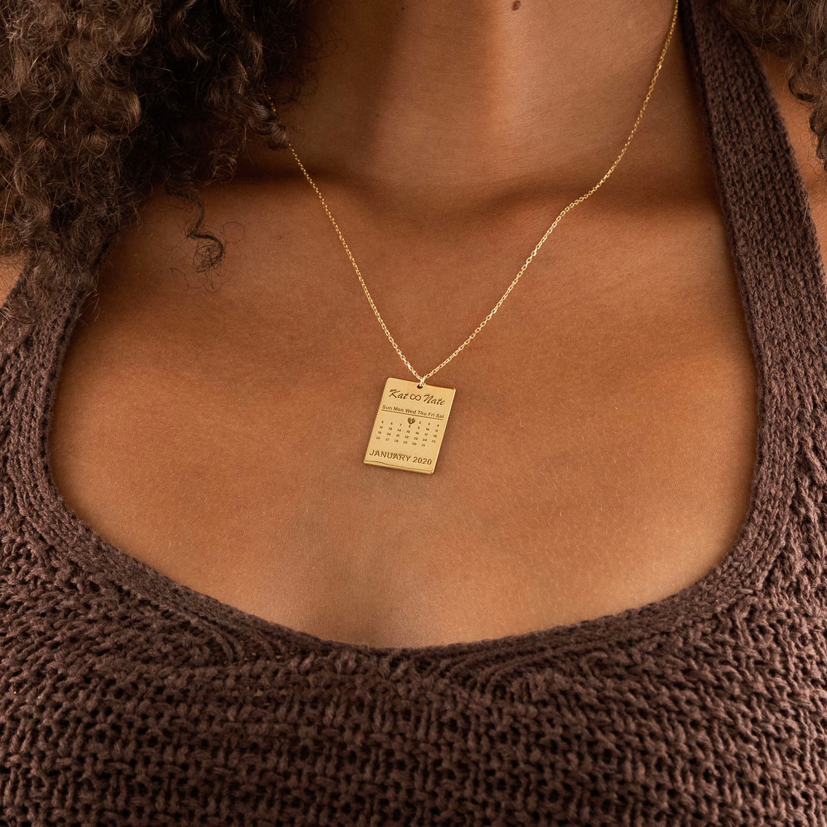Gold personalized calendar necklace with two names and special date