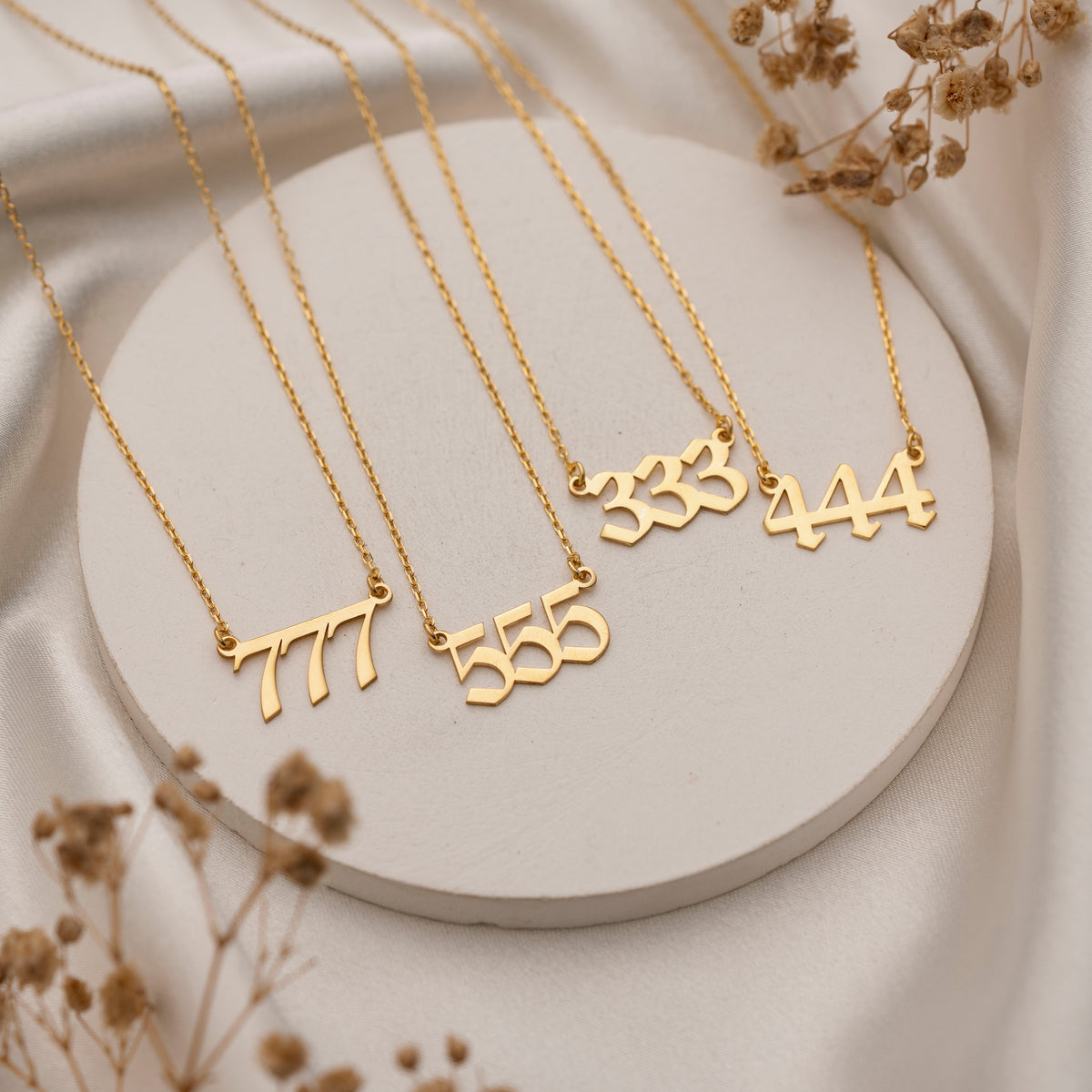 Gold numerology necklace pendant close-up