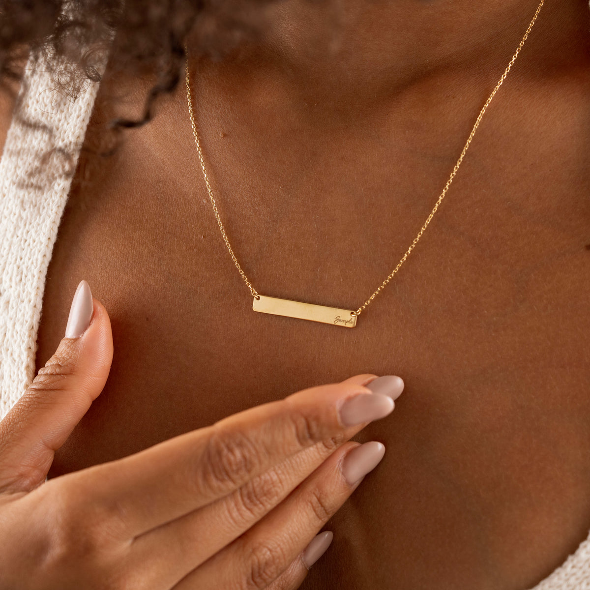 Gold rectangular bar pendant with custom engraving