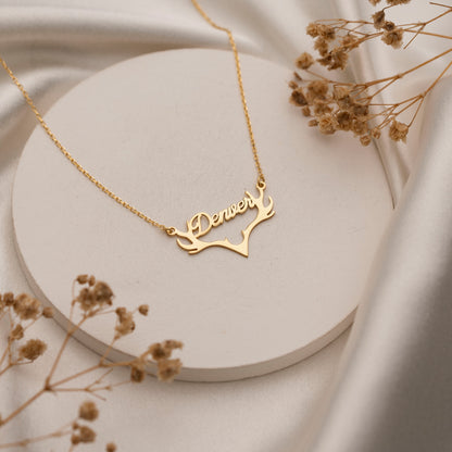 Personalized deer antler necklace worn by model