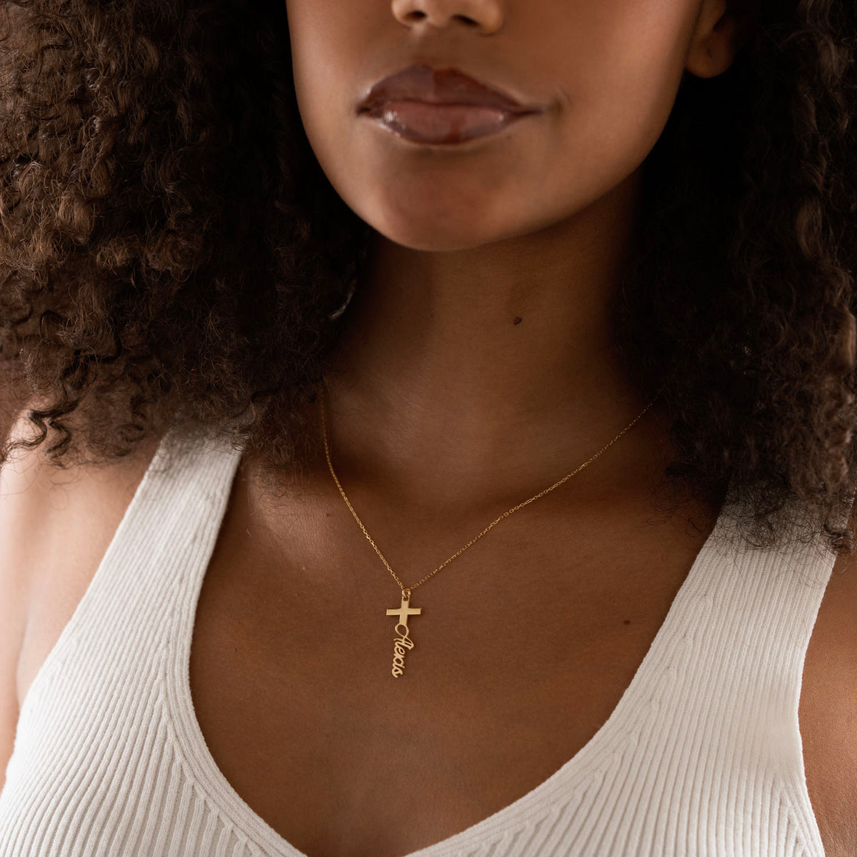 Custom script name and cross necklace close-up