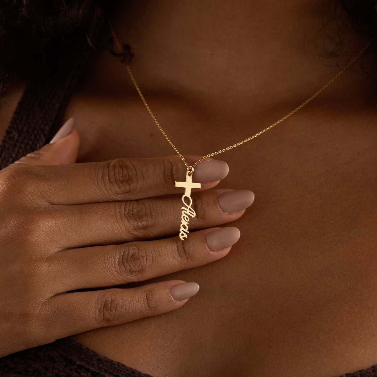 Script lettering detail on personalized cross necklace