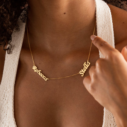 Personalized script names positioned along necklace chain