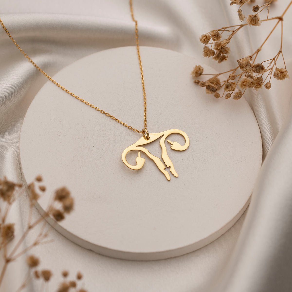 Silver anatomical uterus necklace for everyday wear