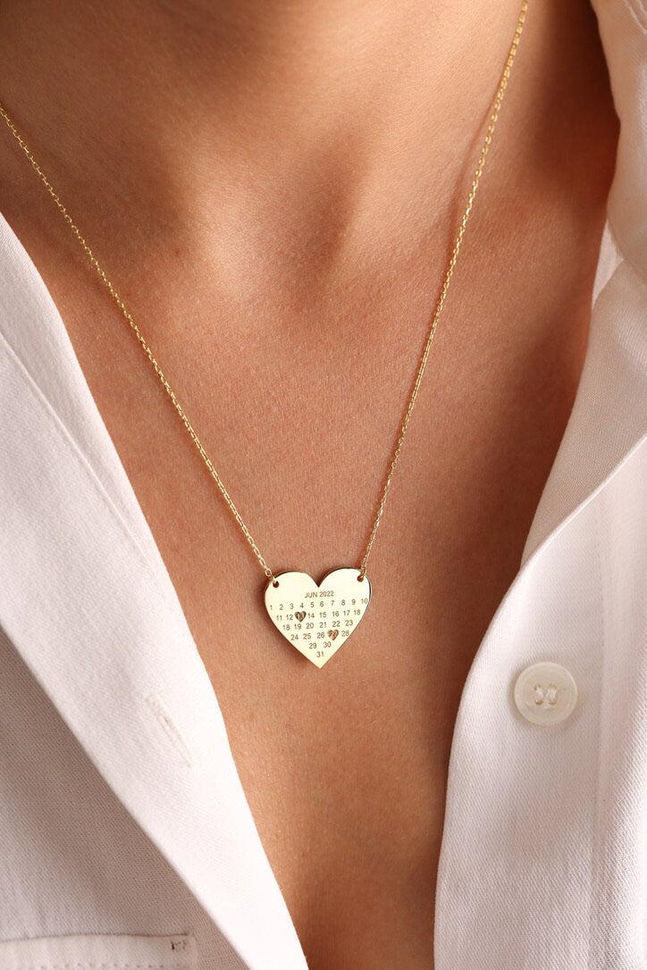 Personalized heart calendar pendant close up