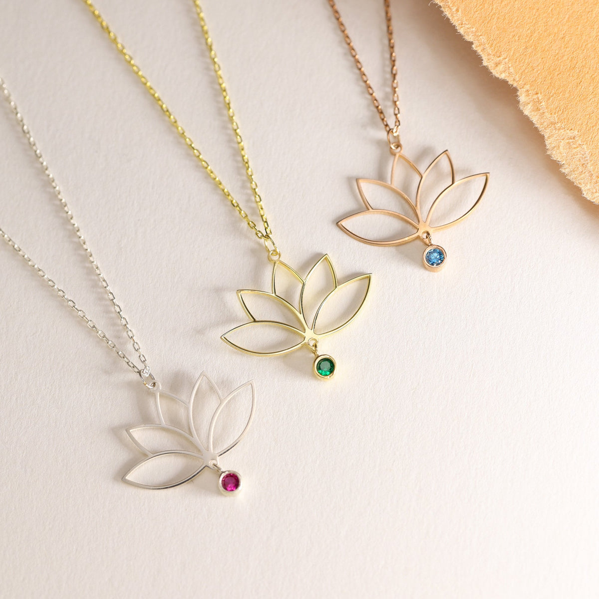 Minimalist lotus necklace worn on the neck