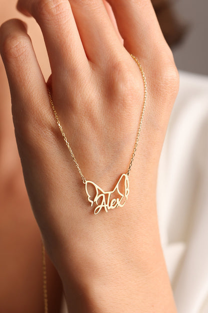 Dog ears name necklace in gold with the name Alex