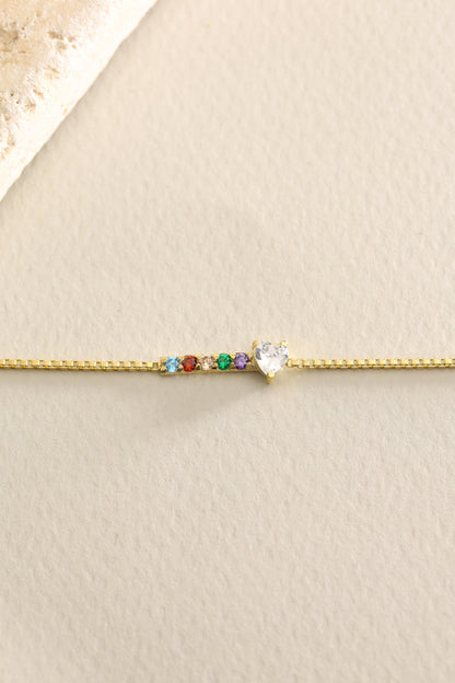 Birthstone bracelets laid flat showing multiple stones