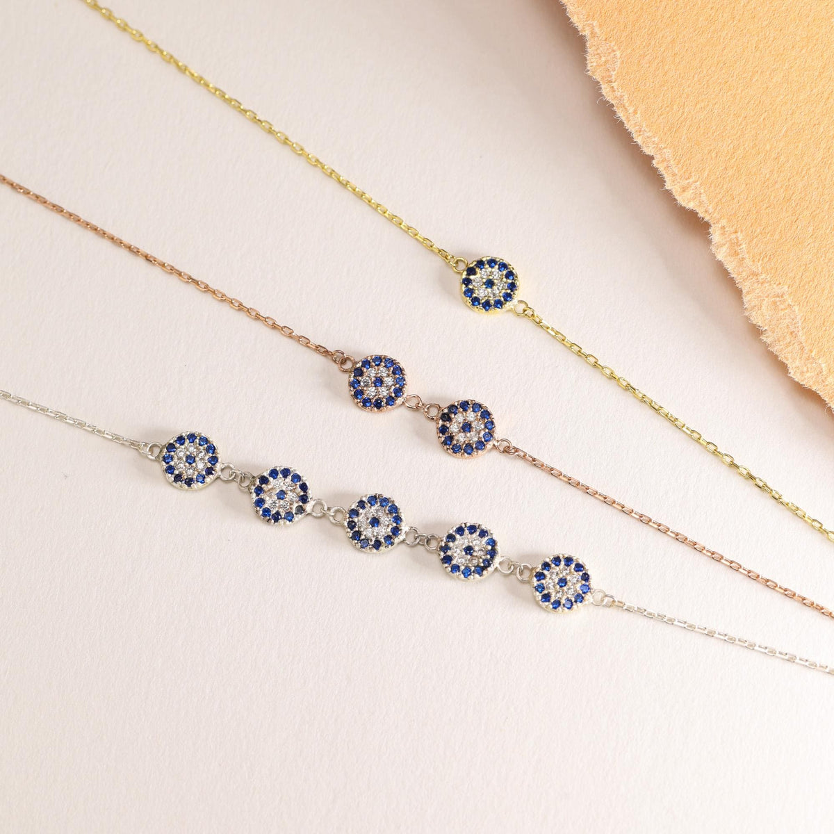 Evil eye charm bracelet and necklace