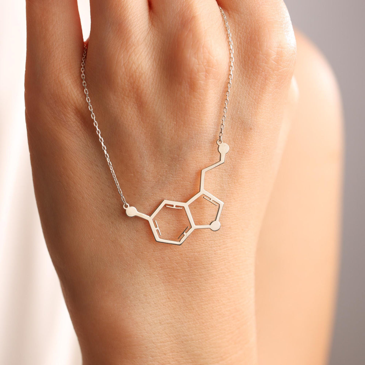 Serotonin molecule birthstone necklace detail
