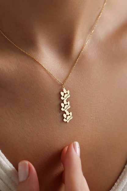 Personalized paw print memorial necklace on the neck