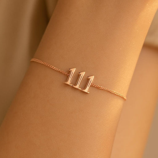 Bubble digit angel number bracelet worn on the wrist