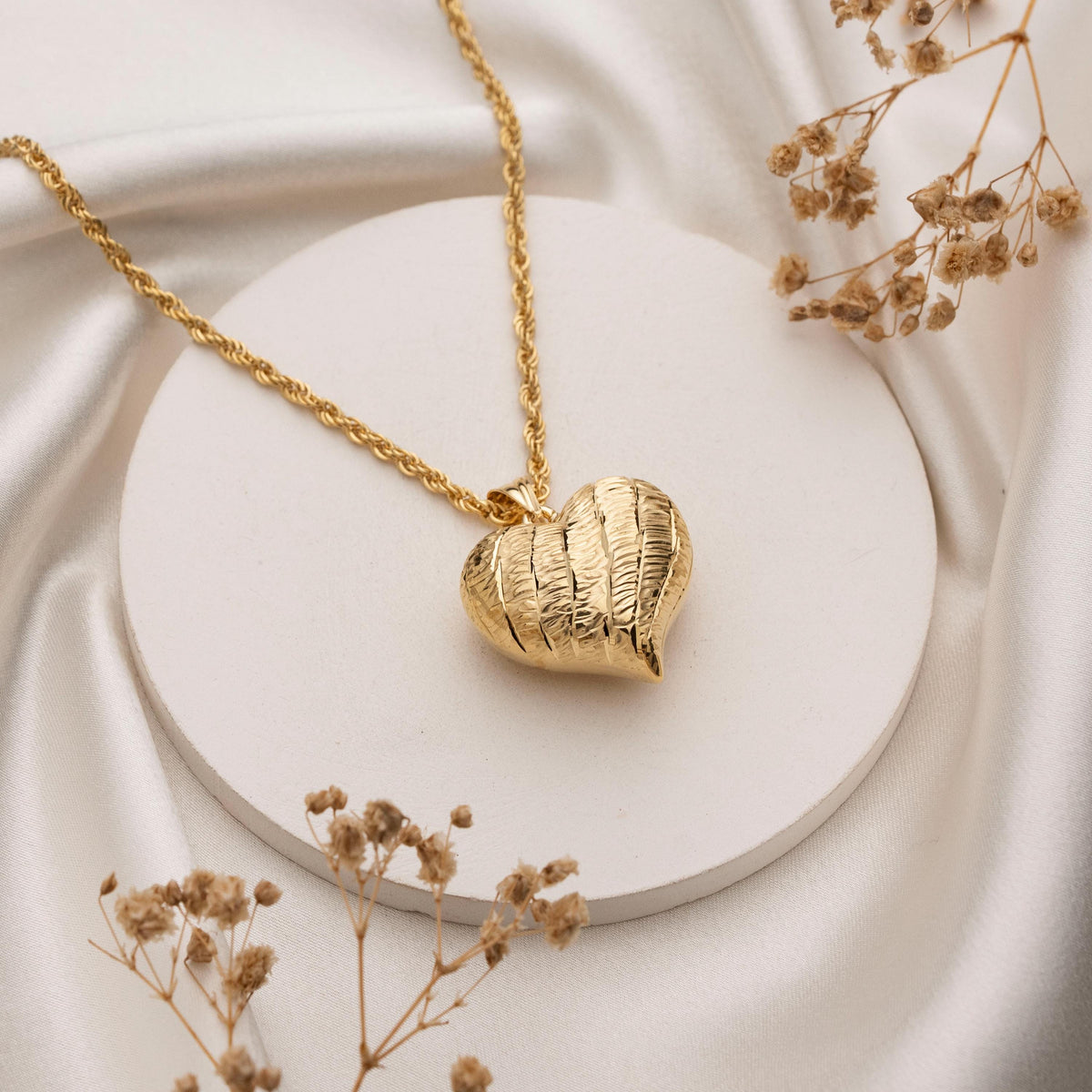 Hammered heart pendant detail