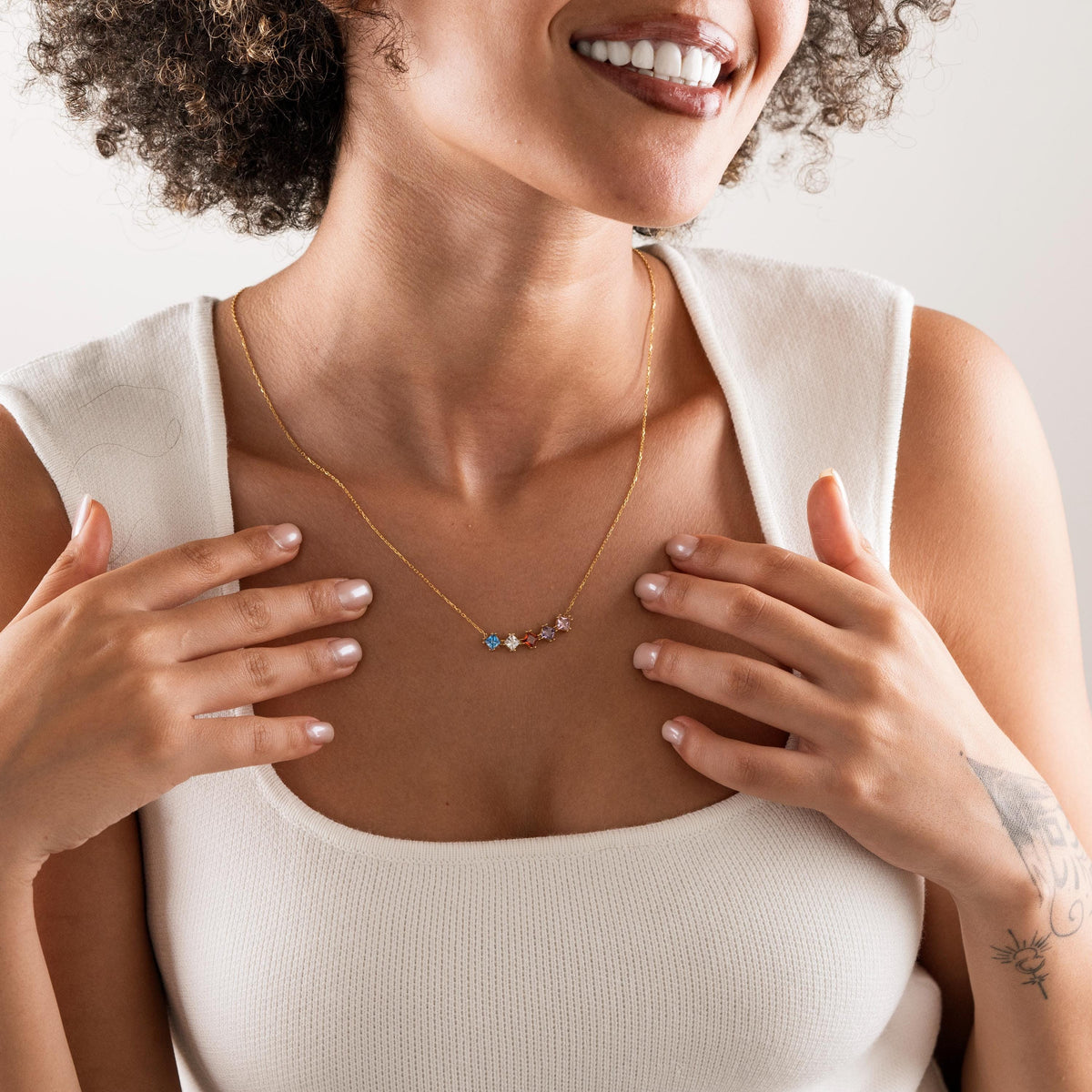 Birthstone bar necklace shown in several colours