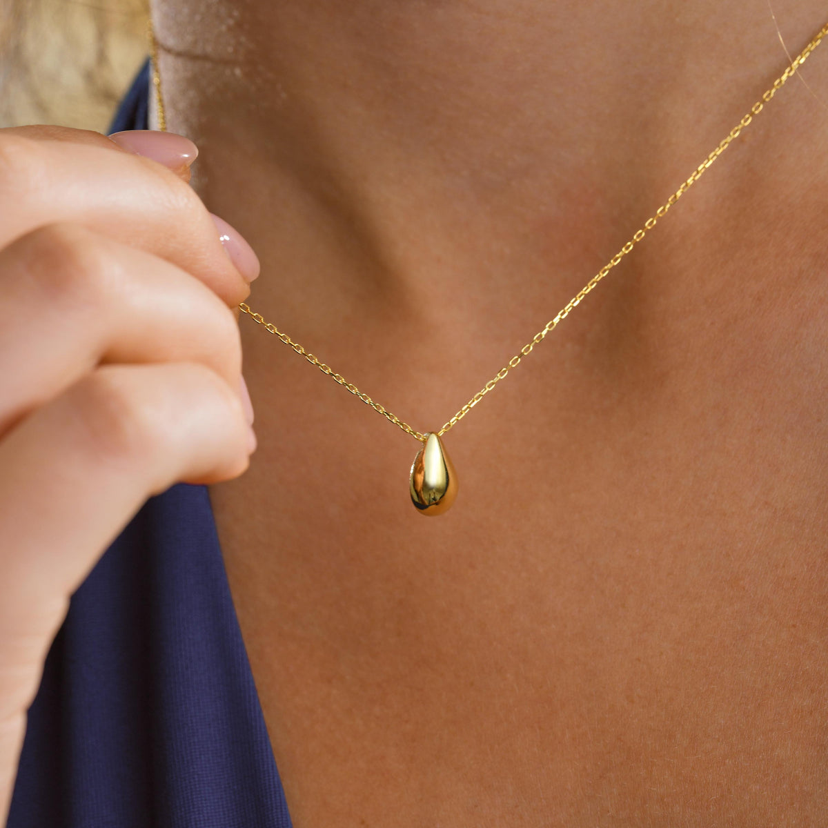 Teardrop pendant close up on the chain