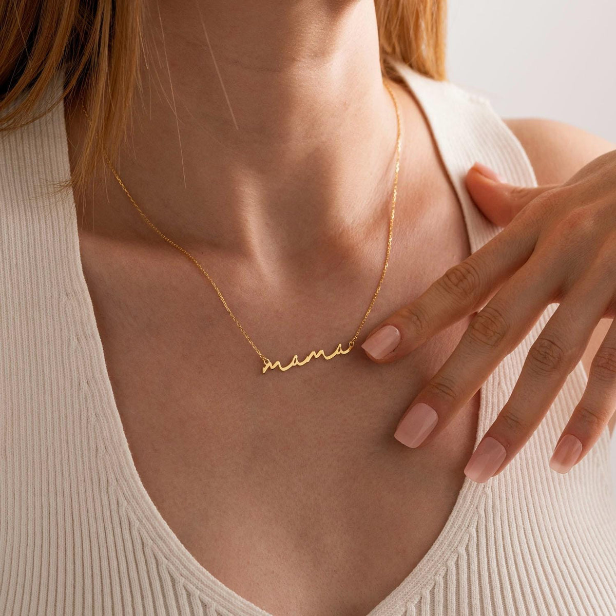 Mama nameplate necklace worn on the neck