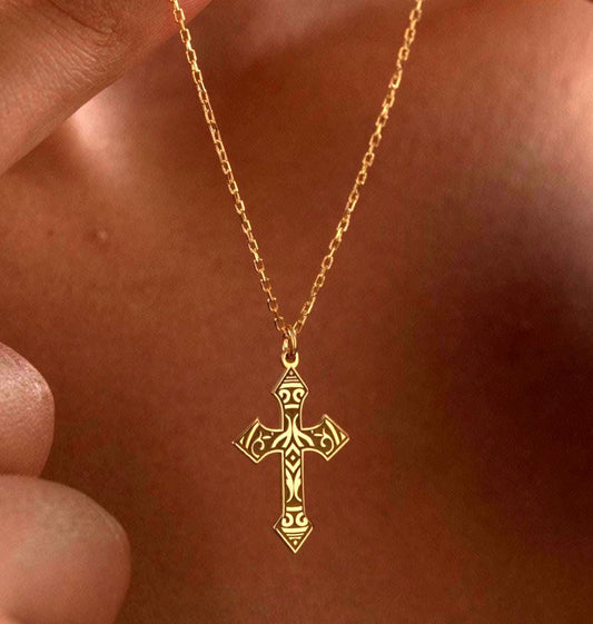 Antique cross pendant necklace worn on the neck