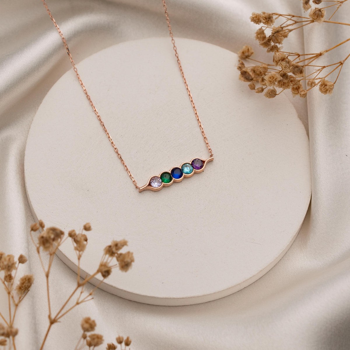 Kids birthstones set together on a fine chain