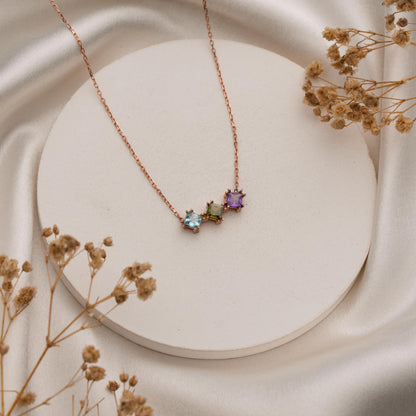 Overlapping family birthstone pendant detail