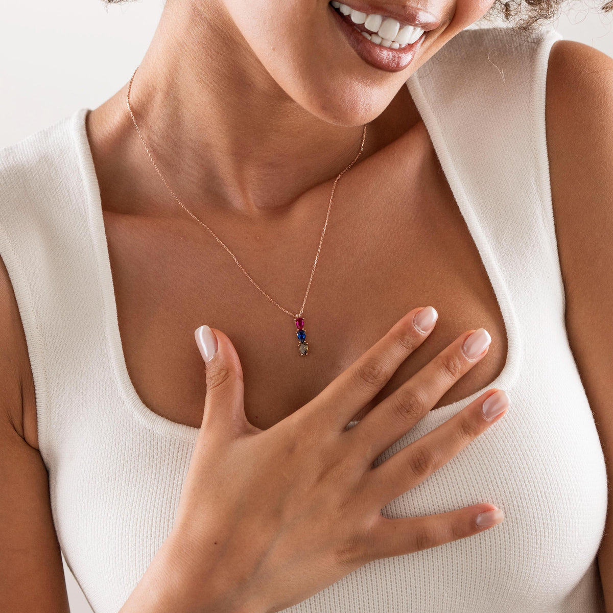 Pear shaped birthstone on a fine chain