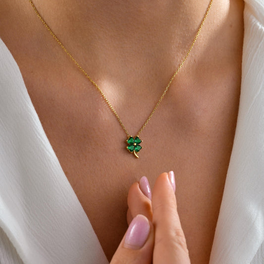 Four leaf clover birthstone necklace worn on the neck