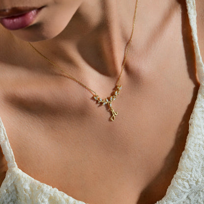 Deer antler and letter pendant detail