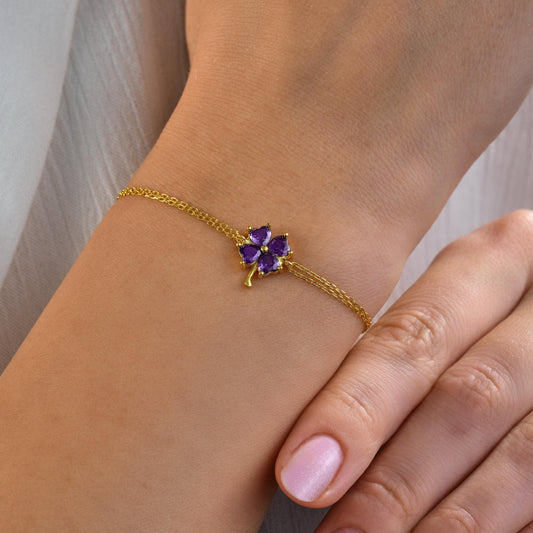 Dainty flower charm with a centre birthstone