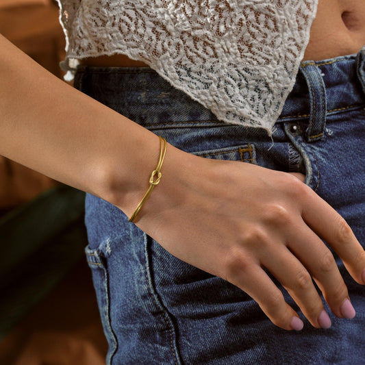 Adjustable love knot cuff detail