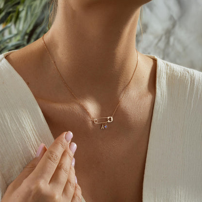 Engraved safety pin pendant close up