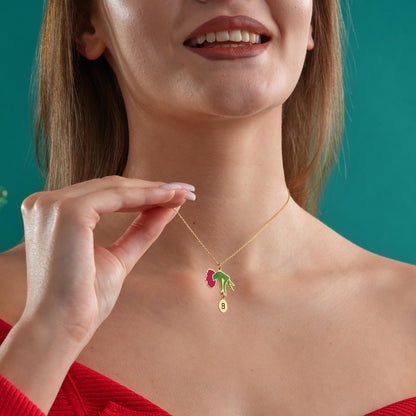 Flower initial necklace worn on the neck