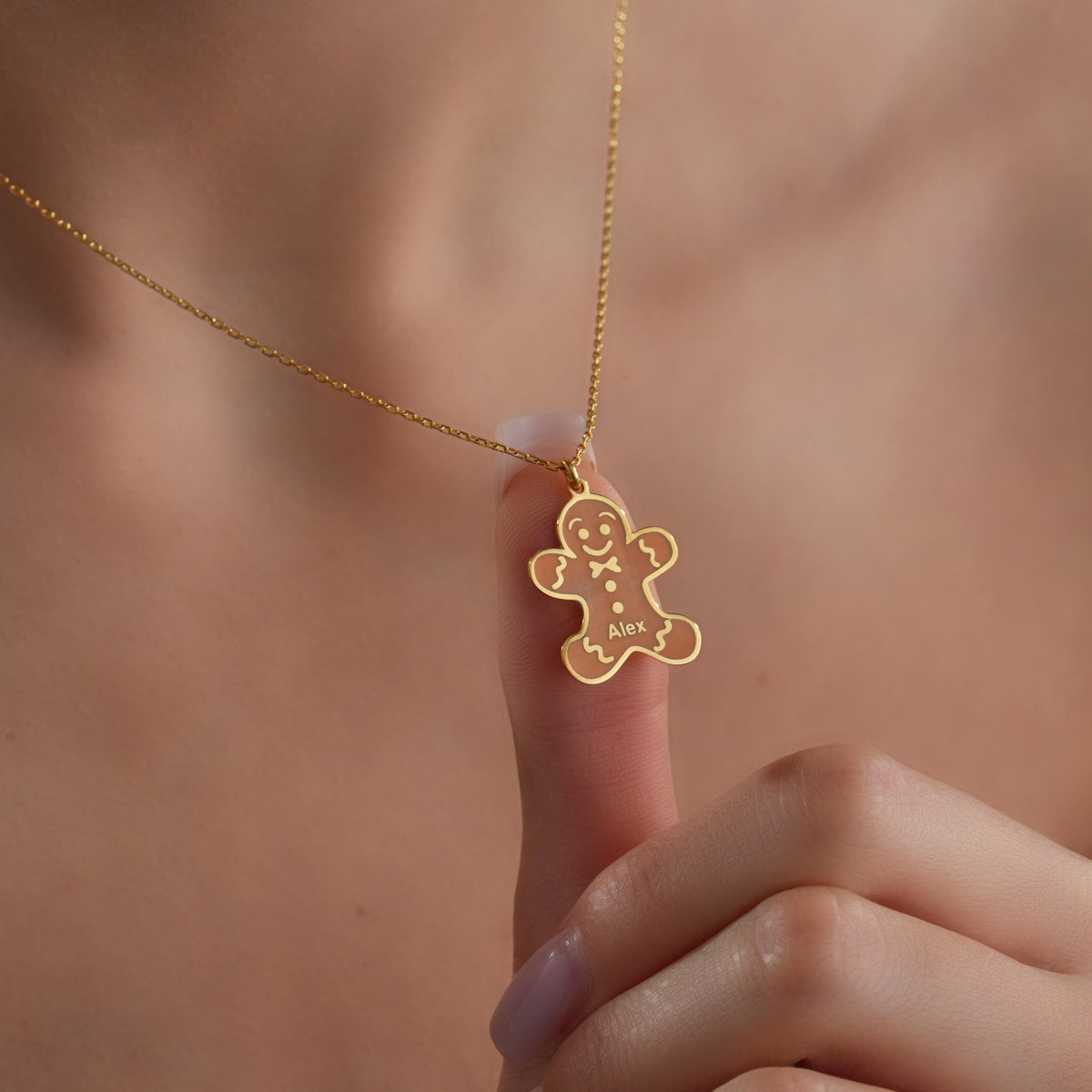 Gingerbread man name necklace styled as a Christmas gift