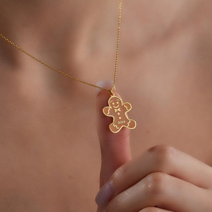 Gingerbread man name necklace styled as a Christmas gift