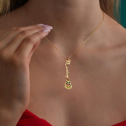 Gift box name necklace styled as a Christmas present