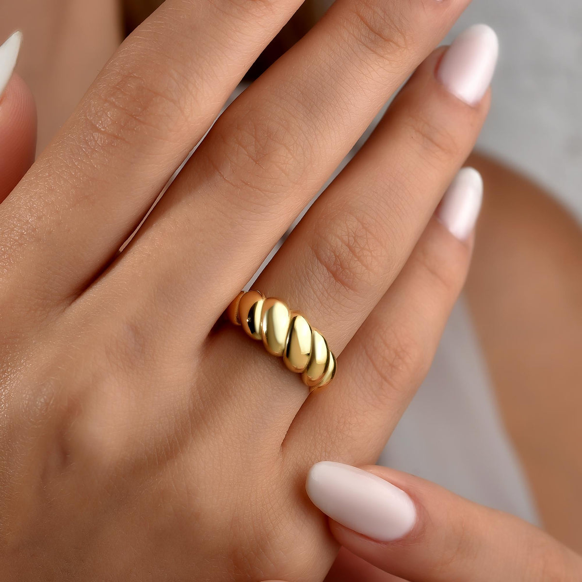 Chunky dome ring detail showing the rope twist