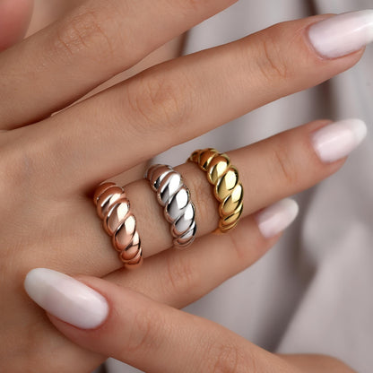 Croissant dome rings worn in gold, silver and rose gold