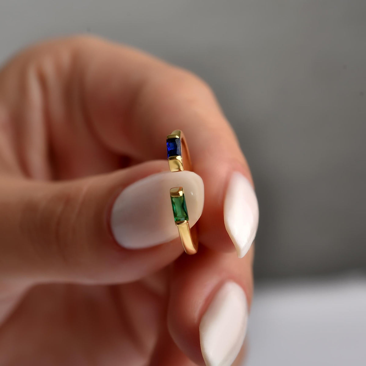 Baguette birthstone ring stacked with another band
