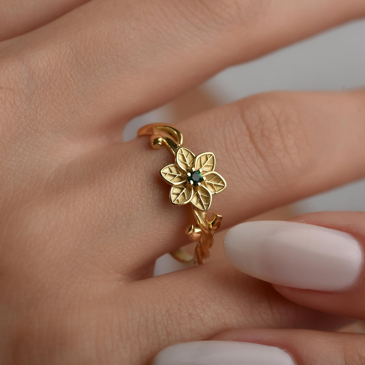 Personalized flower ring styled on the finger